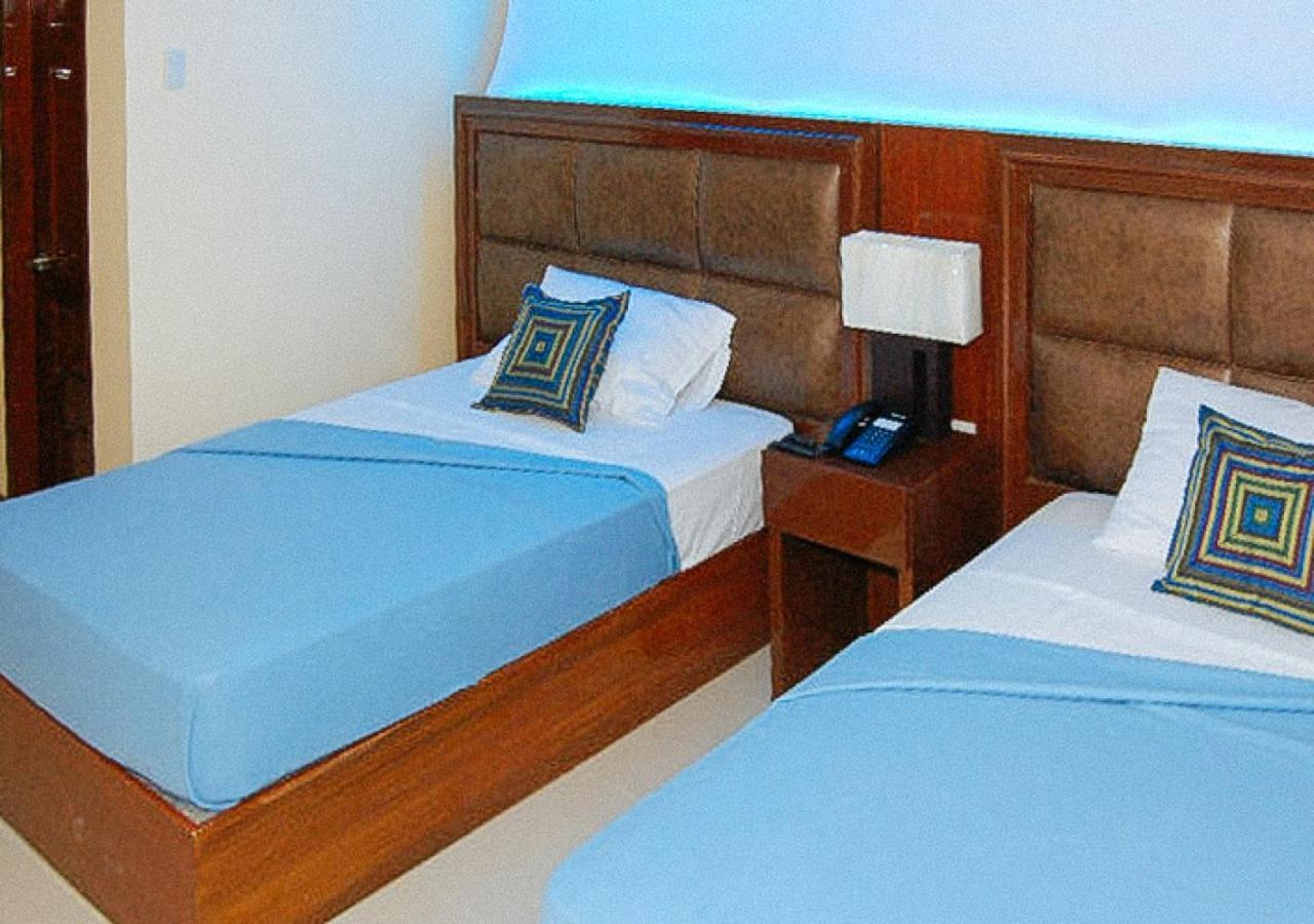 Sky Garden Hotel By Reddoorz Roxas Habitación foto